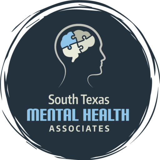 South Texas Mental Health Associates logo with a human head silhouette and puzzle piece, symbolizing mental health.