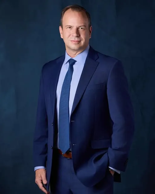 Dr. John Lusins III, MD, board-certified psychiatrist and Medical Director of Esperanza de Tejas